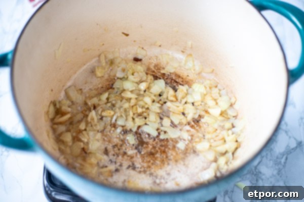 Sautéd onions and garlic in a dutch oven