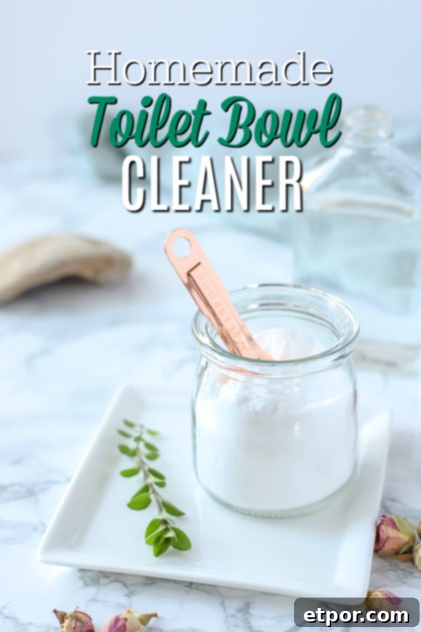 homemade toilet bowl cleaner in a glass dish with a copper spoon on a white plate