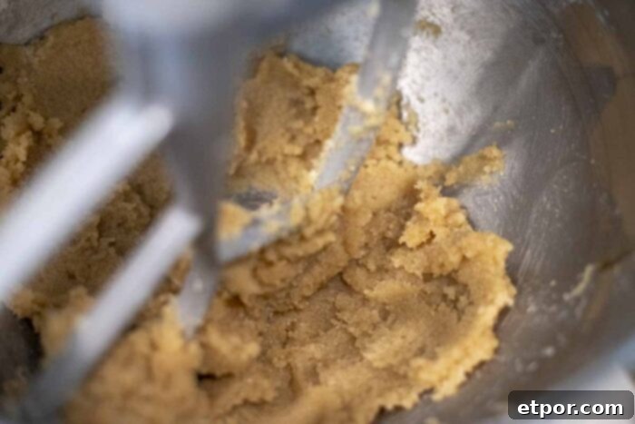 Creaming butter and sugar together.