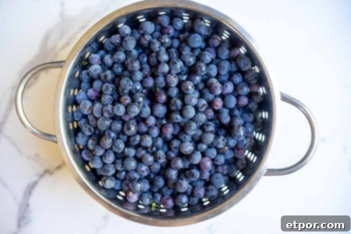 Grapes washed in a colander.