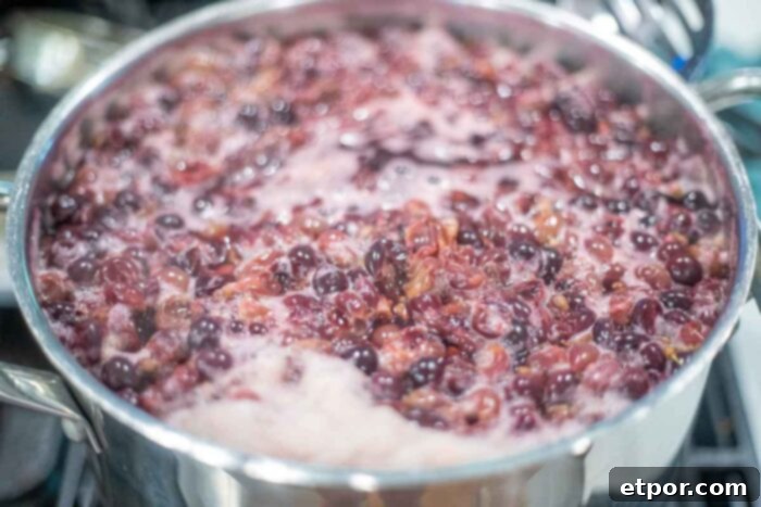 Boiling grapes in a pot.