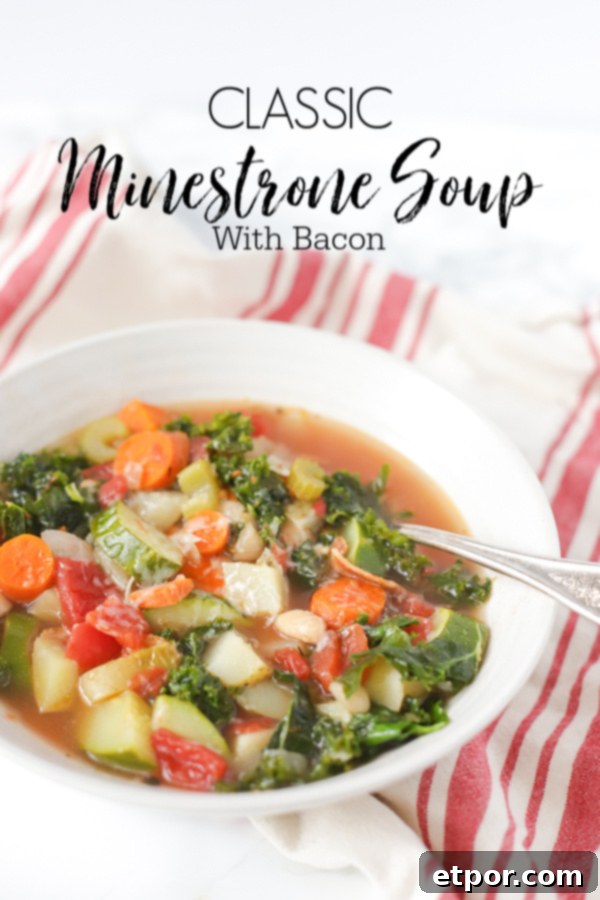 Smoky Bacon Minestrone Comfort Food 2 A beautiful bowl of classic minestrone soup with savory bacon, fresh vegetables, and a rich broth, served in a white bowl on a rustic striped towel.