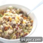 A small bowl of steak and rice salad