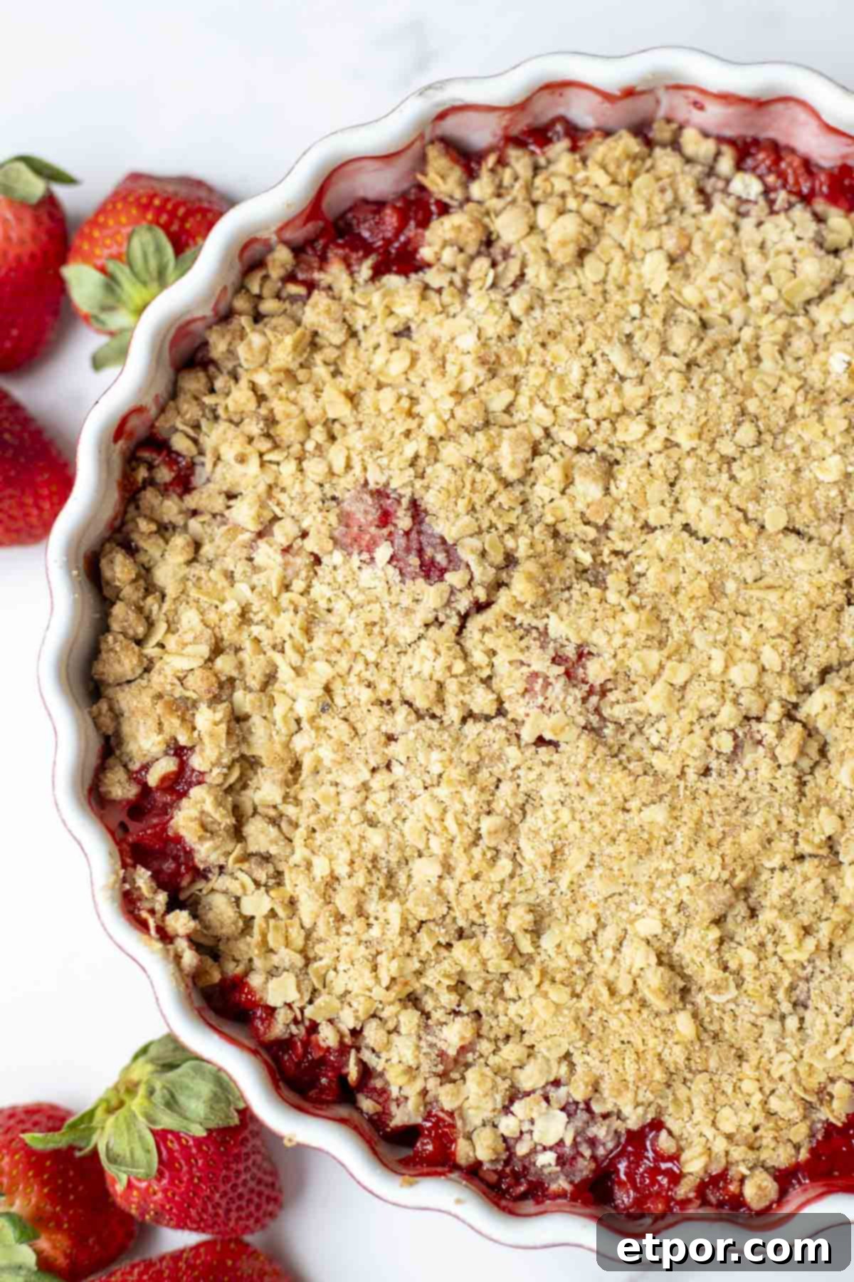 Simple Strawberry Crumble Bliss 9 baked strawberry crisp tin a baking dish.