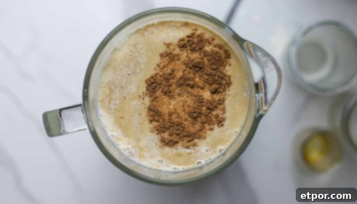 eggs, cream, milk, vanilla, and nutmeg in a blender jar