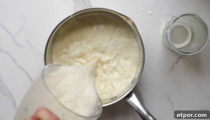 eggnog mixture transferred to a saucepan