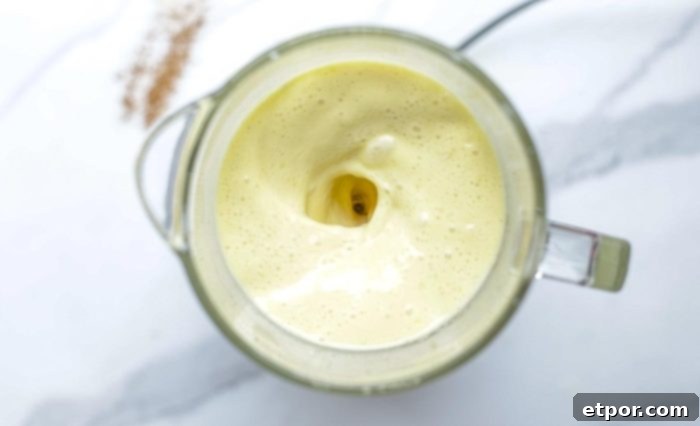 custard base blending in a blender.