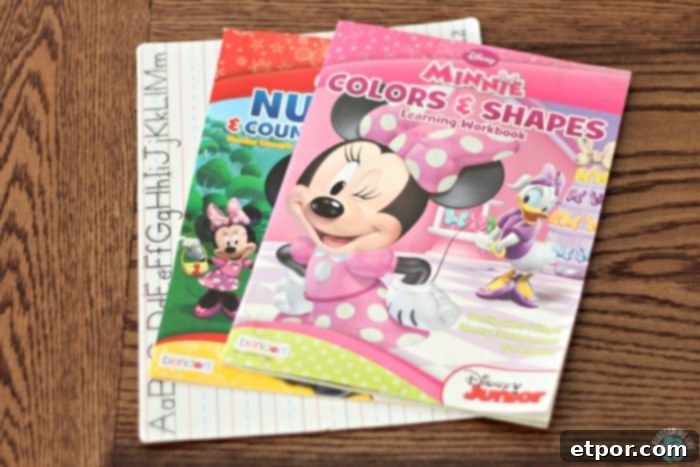 Homeschooling Preschool: Your Step-by-Step Guide 4 Three colorful educational books featuring Disney characters, perfect for homeschooling preschoolers
