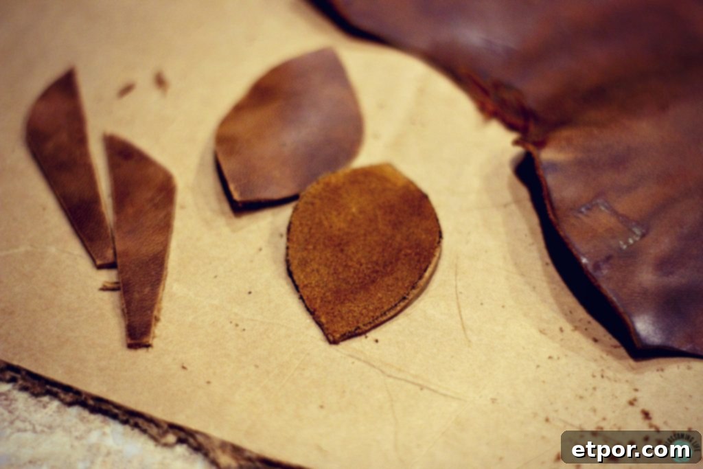 cutting out leather pieces for DIY leather earrings