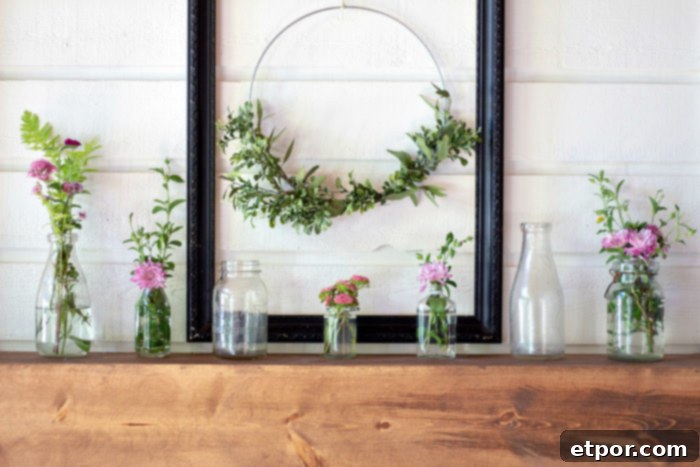 DIY Fireplace Mantel with stained wood on a white fireplace with shiplap, enhancing the room's aesthetic