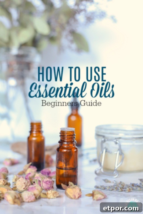 3 bottles of essential oils with rose buds, diy products, and eucalyptus behind it