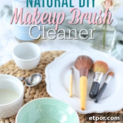 Natural DIY makeup brush cleaner in a teal bowl on a ratan placemat with makeup brushes and ingredients behind it