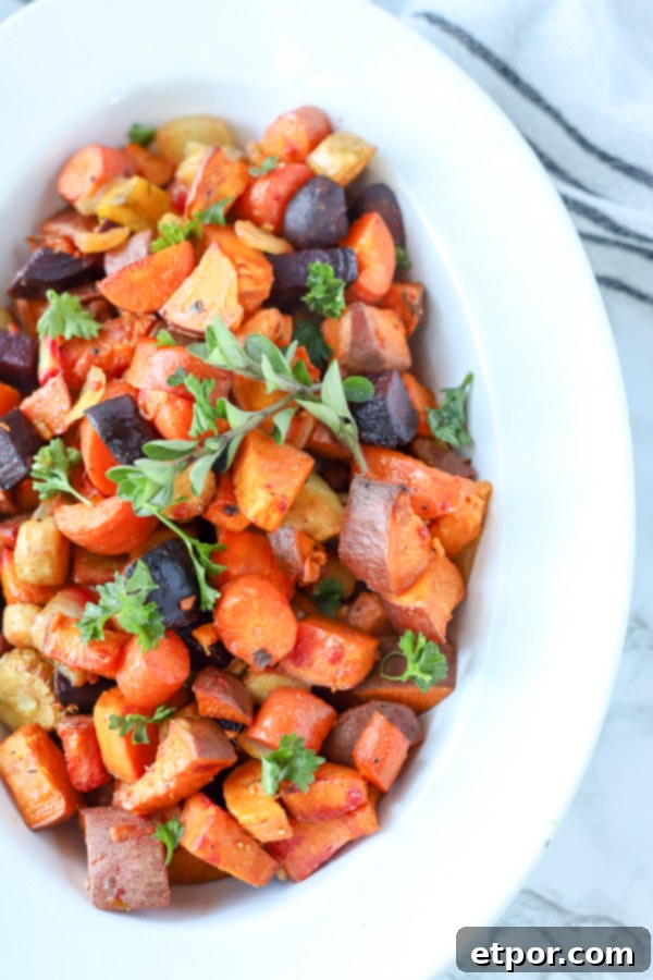 Rustic Roasted Root Vegetables 4 roasted root vegetable recipe in a white bowl, ready to serve as a delicious side dish