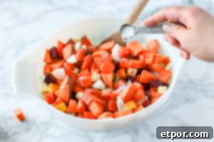 Rustic Roasted Root Vegetables 9 adding salt to root vegetables for roasted root vegetable recipe