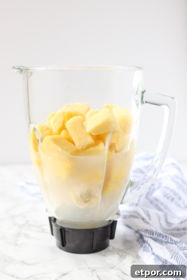 Guilt-Free Tropical Pina Colada Delight 3 coconut milk, banana, and pineapple in a blender