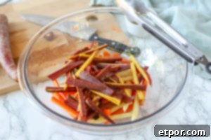 colorful carrots in a glass bowl to make carrot fries