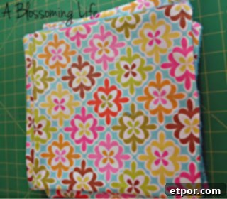 Turning unpaper towels right side out and pressing flat with an iron