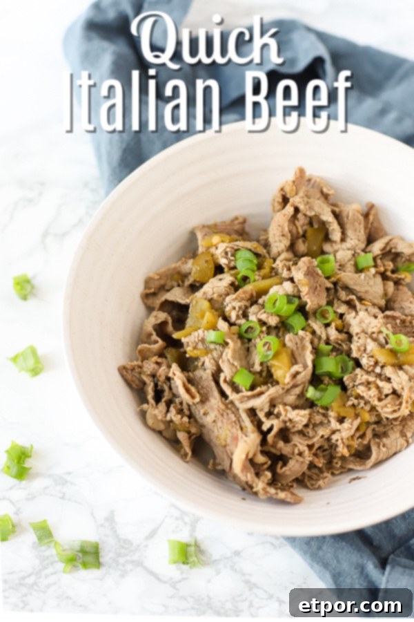 Effortless Chicago Style Italian Beef 2 Chicago style Italian Beef in a white bowl and topped with green onions