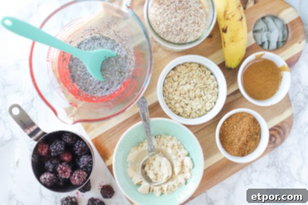 Power-Packed Blackberry Protein Cookies 5 Unbaked blackberry oatmeal protein cookies on parchment paper