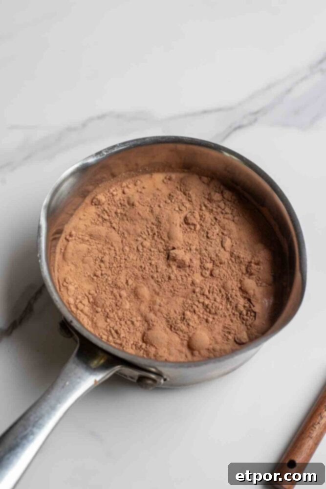 Milk, maple syrup, cocoa powder vanilla and salt in a saucepan.