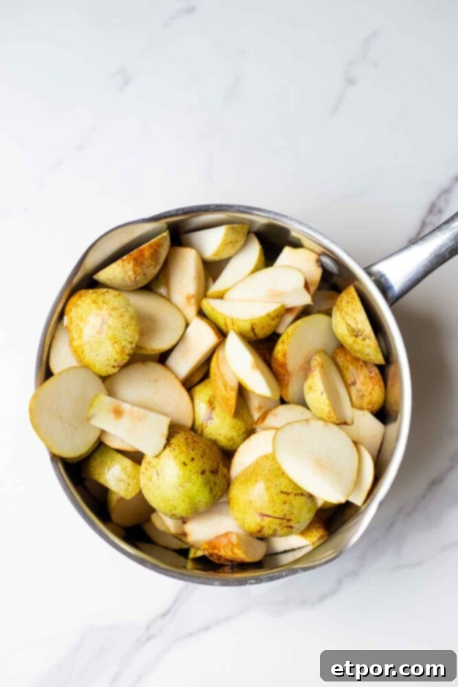 Sliced pears in a pot. 