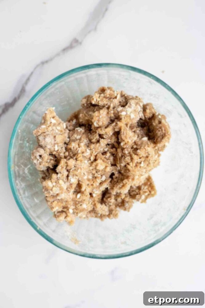 Crisp topping mixed up in a glass bowl.